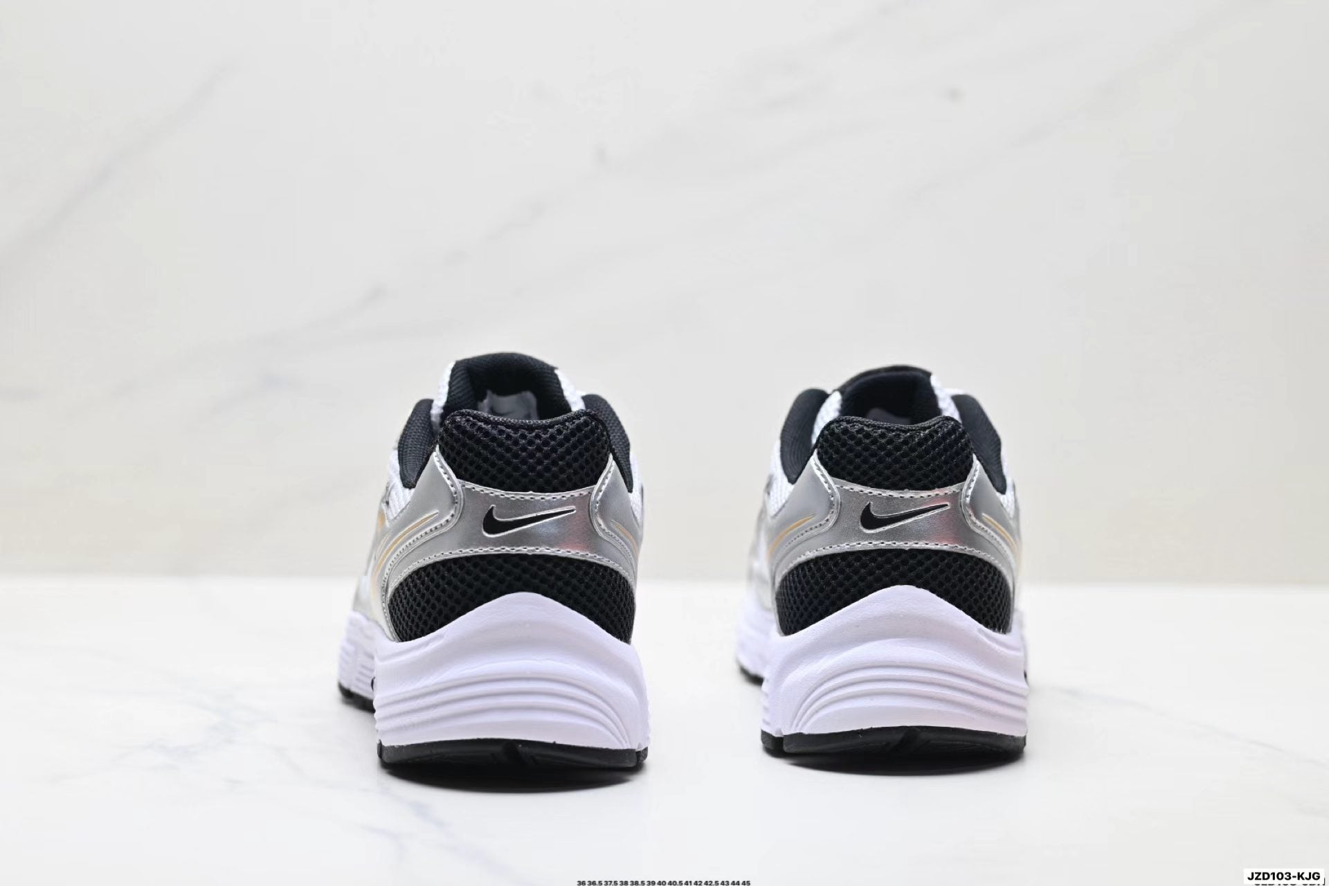 Nike Zoom Vomero 20 in White/Black/Gold: Gilded Performance