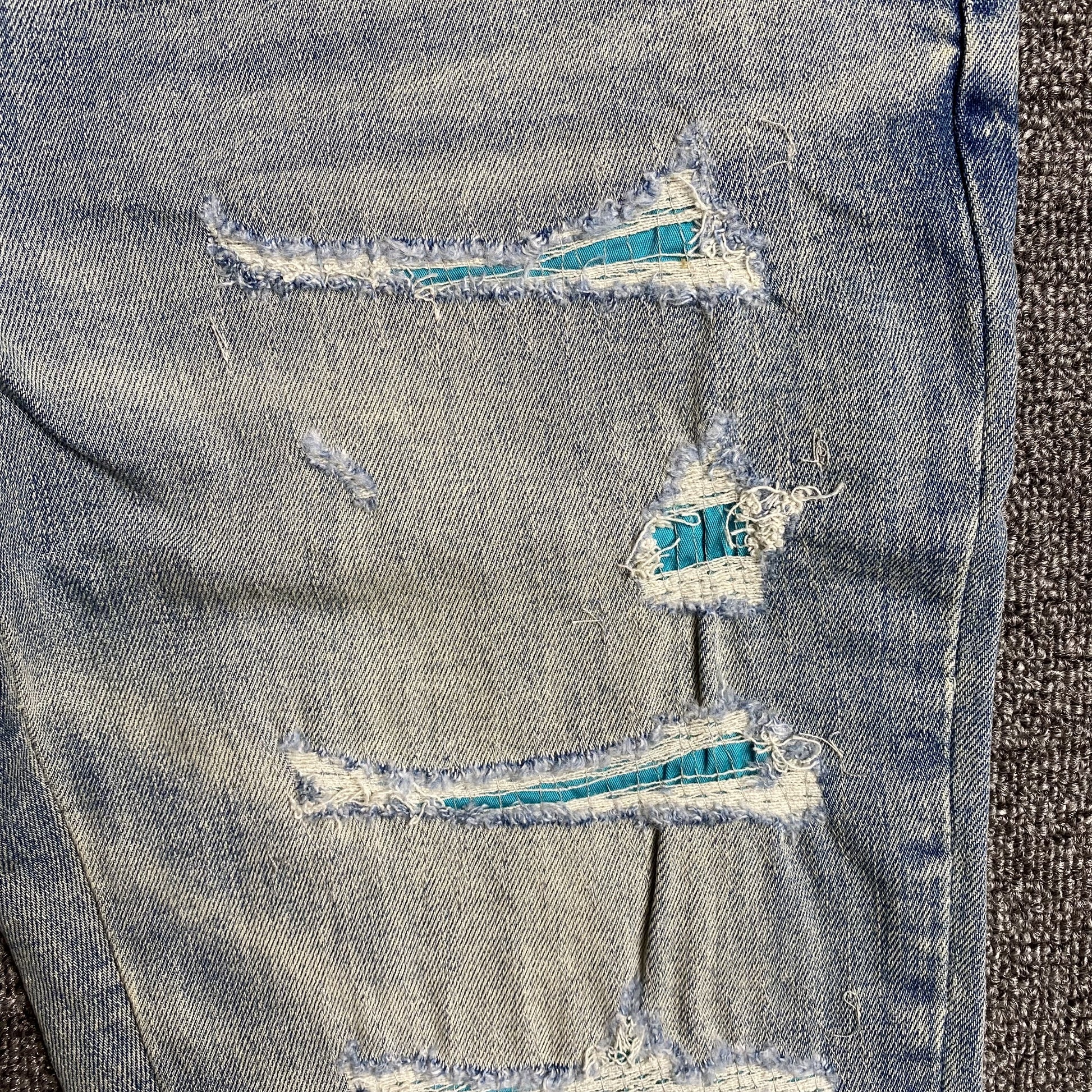 AMIRI VARSITY LOGO JEANS - Prime Reps
