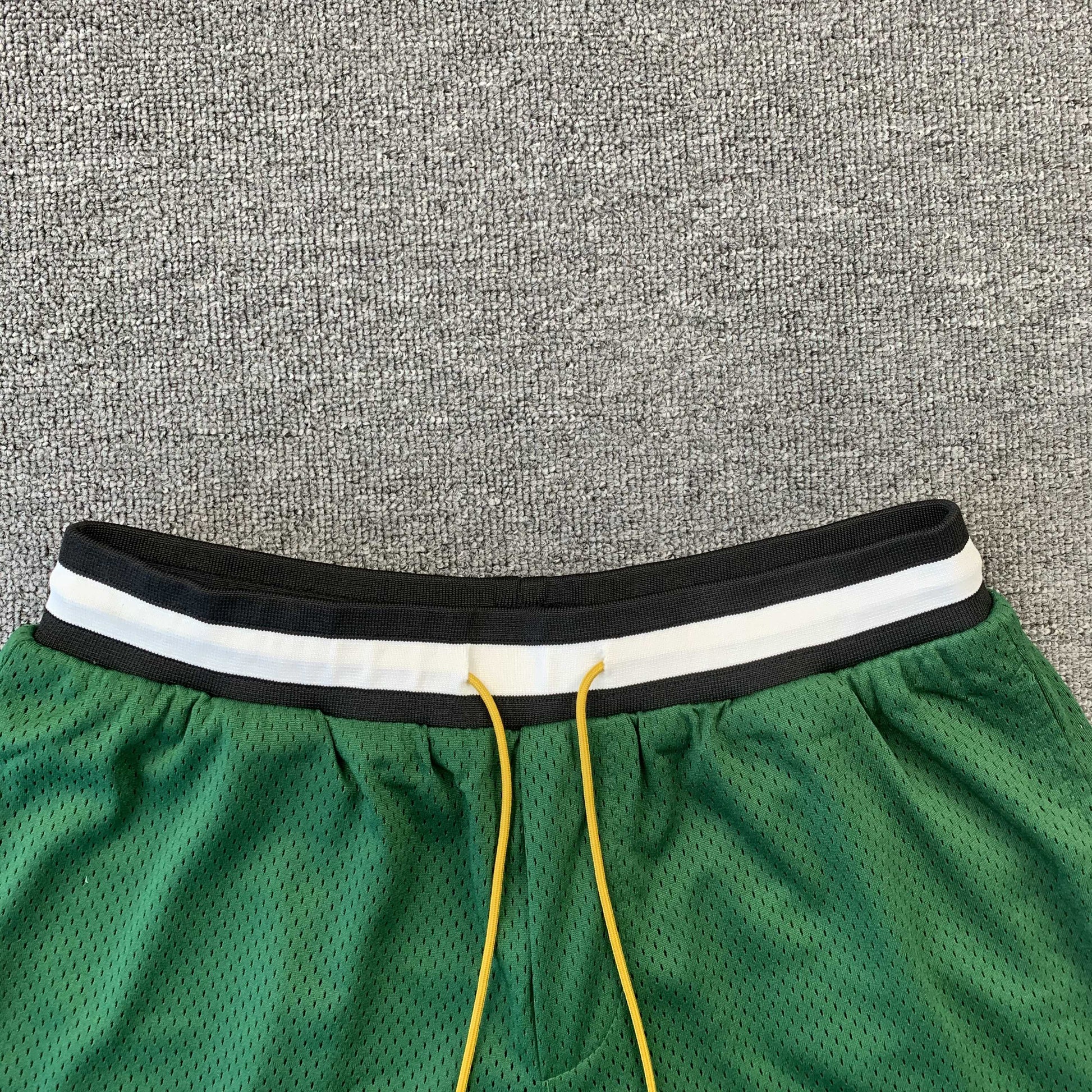 RHUDE COURT LOGO SHORTS GREEN - Prime Reps