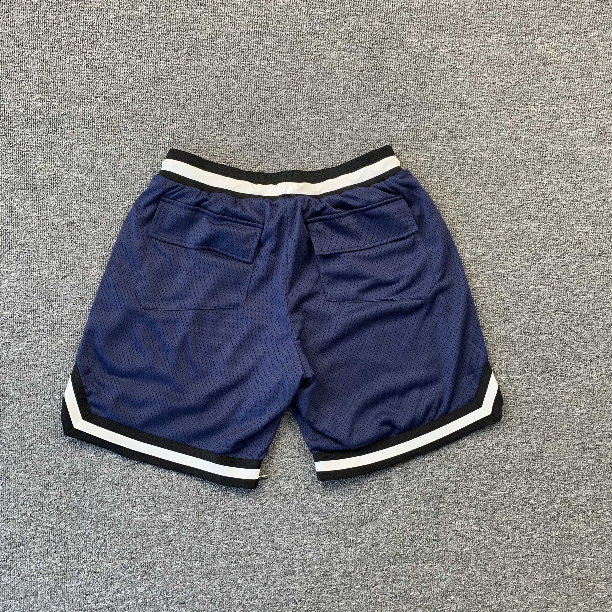 RHUDE COURT LOGO SHORTS NAVY - Prime Reps